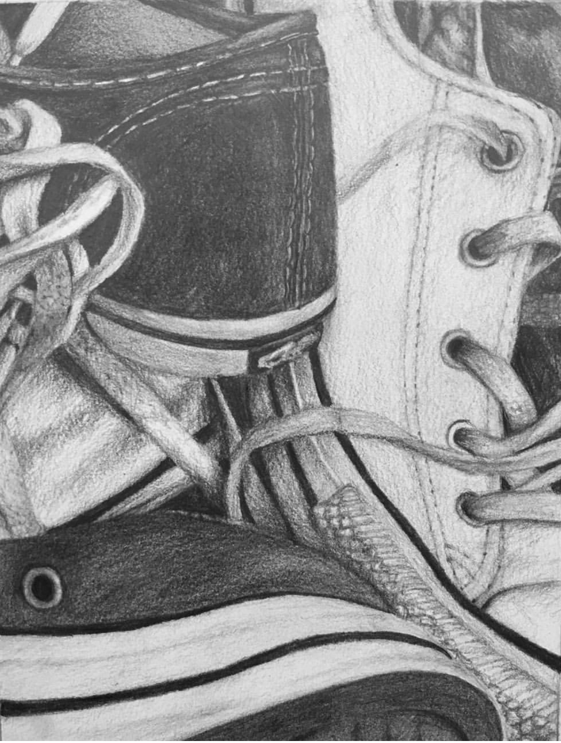 Pencil Drawing of a bunch of converse shoes from a high school drawing lesson called Shoe Frenzy by Mrs. T. Fox Resources on TpT